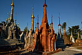 Inle Lake Myanmar. Indein, on the summit of a hill the  Shwe Inn Thein Paya a cluster of hundreds of ancient stupas. Many of them are ruined and overgrown with bushes. 